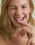 model wearing the groovy diamond heart signet ring on the pinky