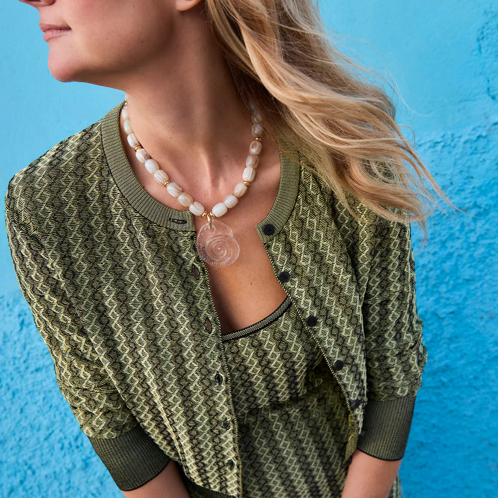 Claudia Necklace on model with green sweater