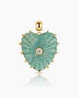 Heart-shaped pendant with green stone and gold accents on a white background