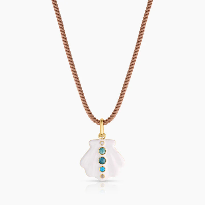 Necklace with a white pendant featuring blue stones on a white background