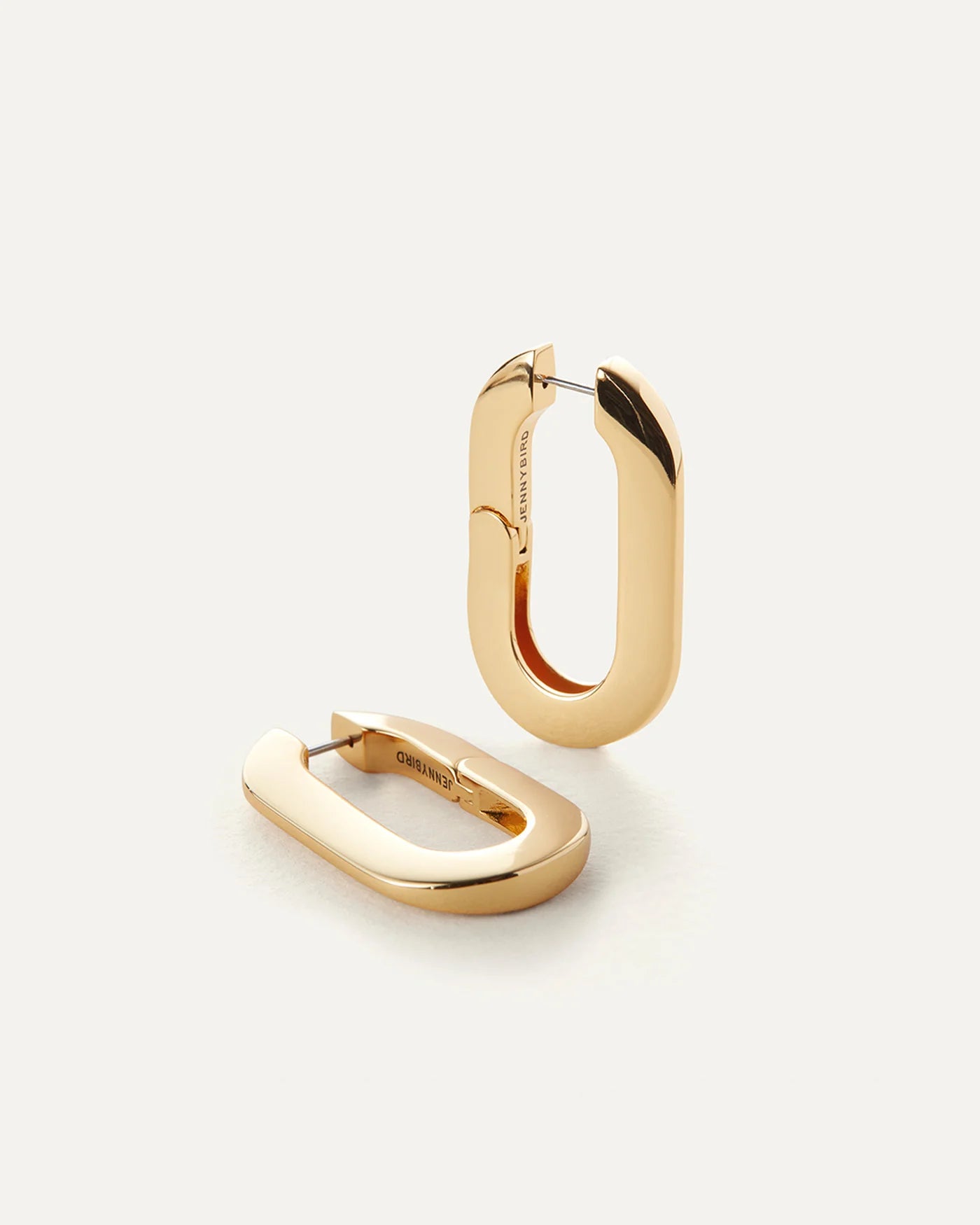 Mega U Link Earrings on white background