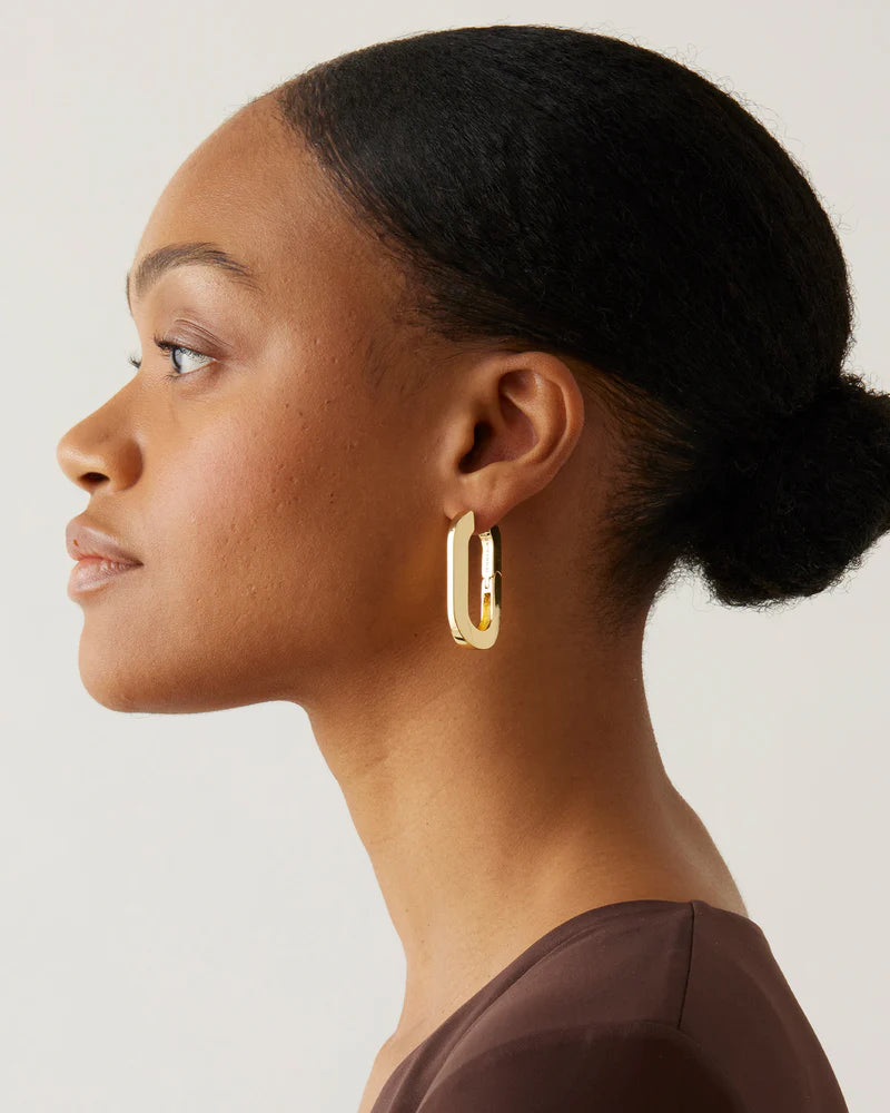 Mega U Link Earrings side view on model