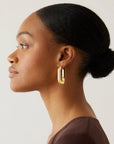 Mega U Link Earrings side view on model
