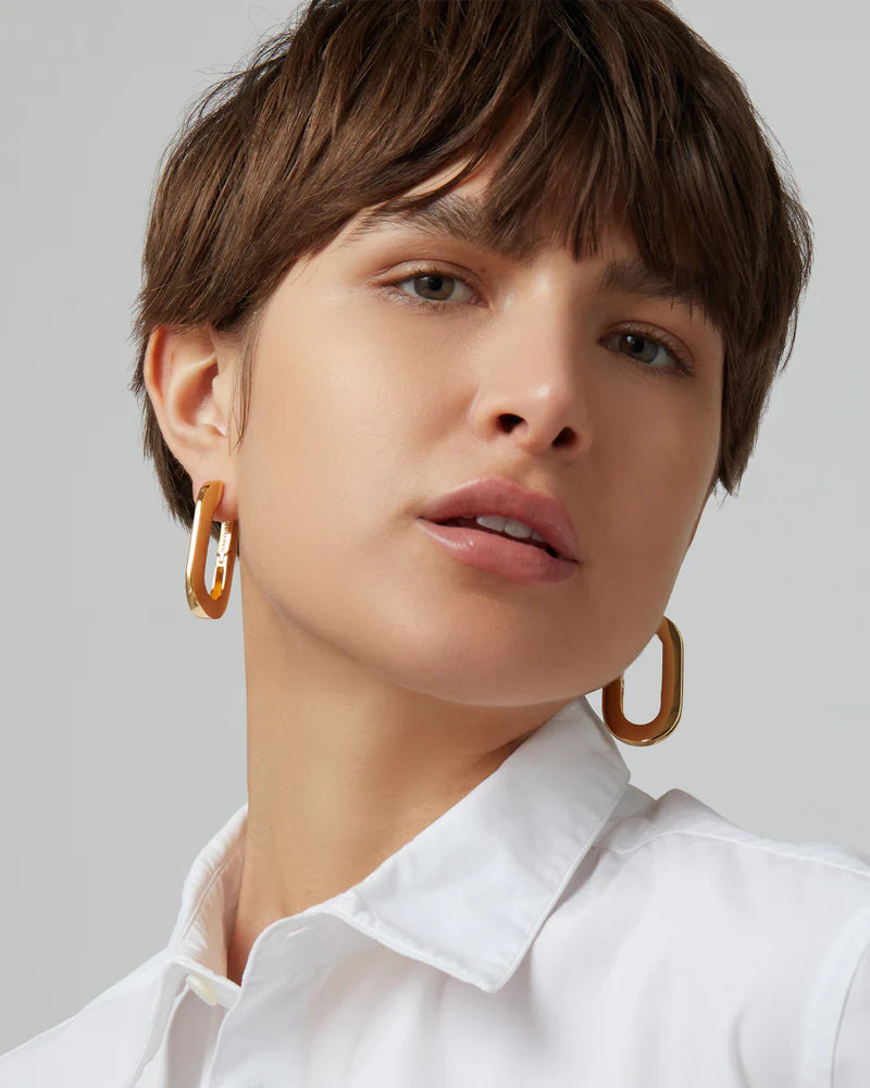 Mega U Link Earrings front view on model