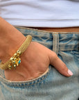 Mesh Charm Bracelet on wrist, hand in pocket