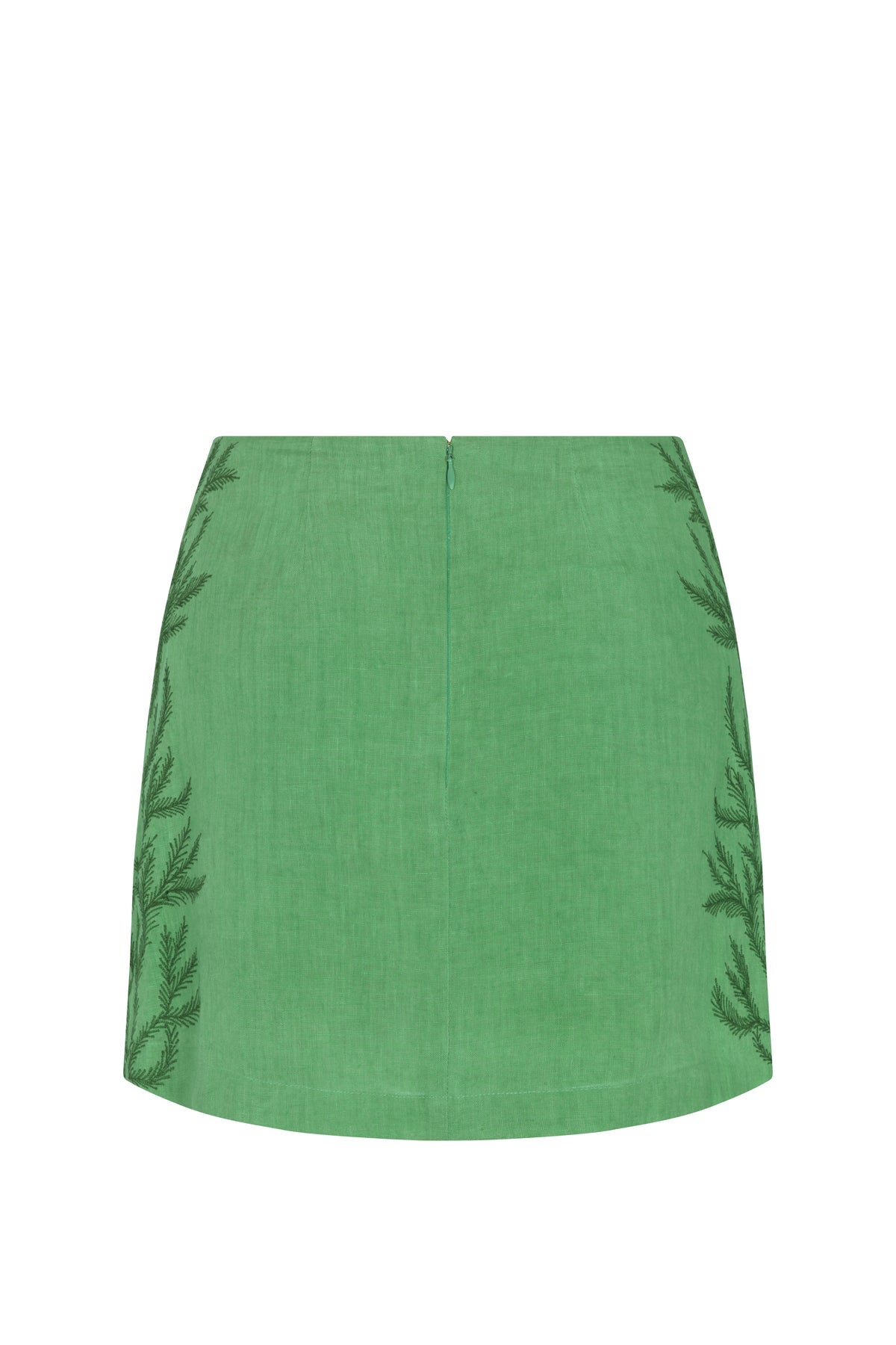 green mini skirt on white background
