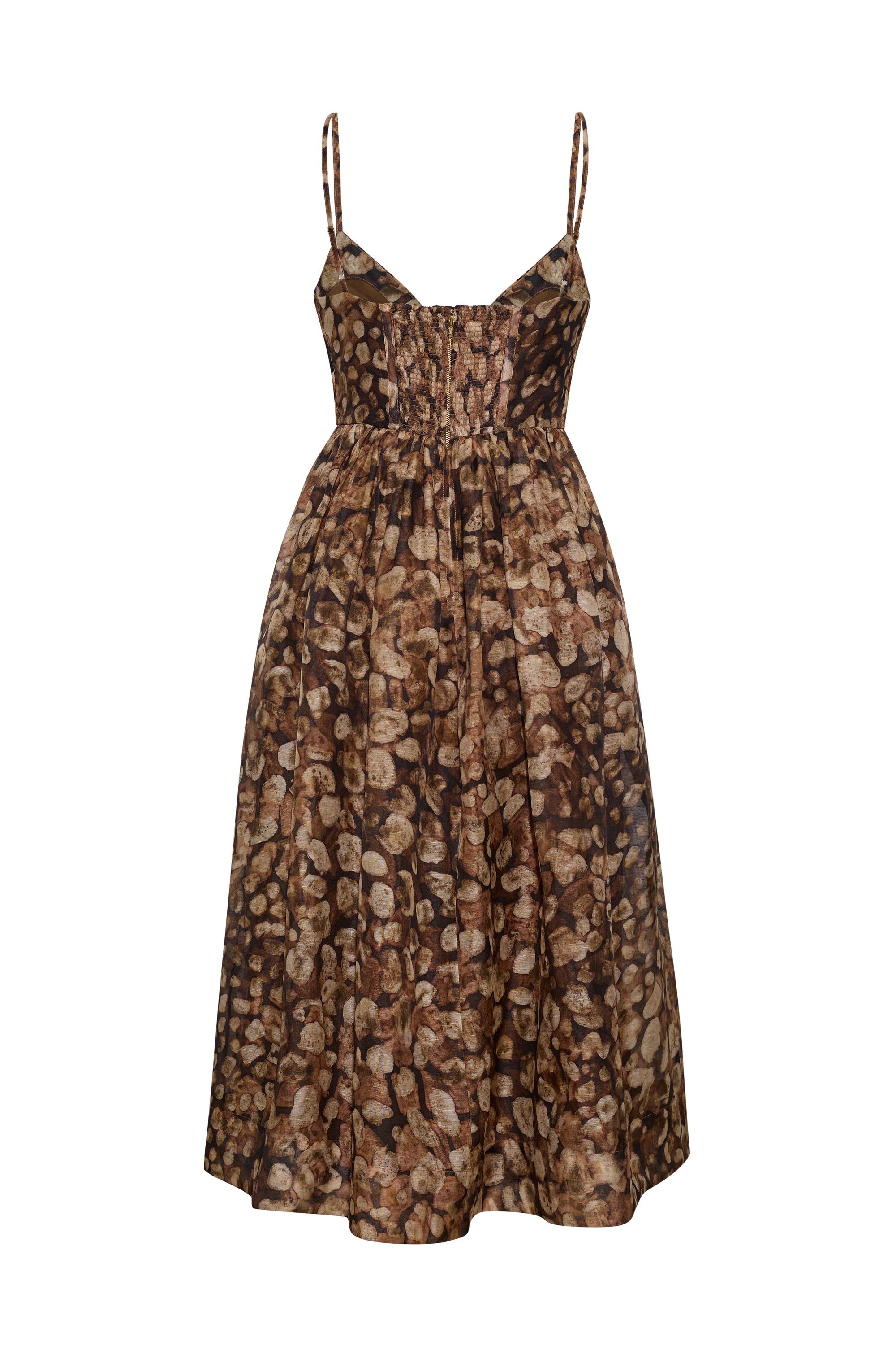 A sleeveless midi dress with thin spaghetti straps and a smocked bodice, featuring an abstract organic pattern in shades of brown, beige, and black, shown against a plain white background.
