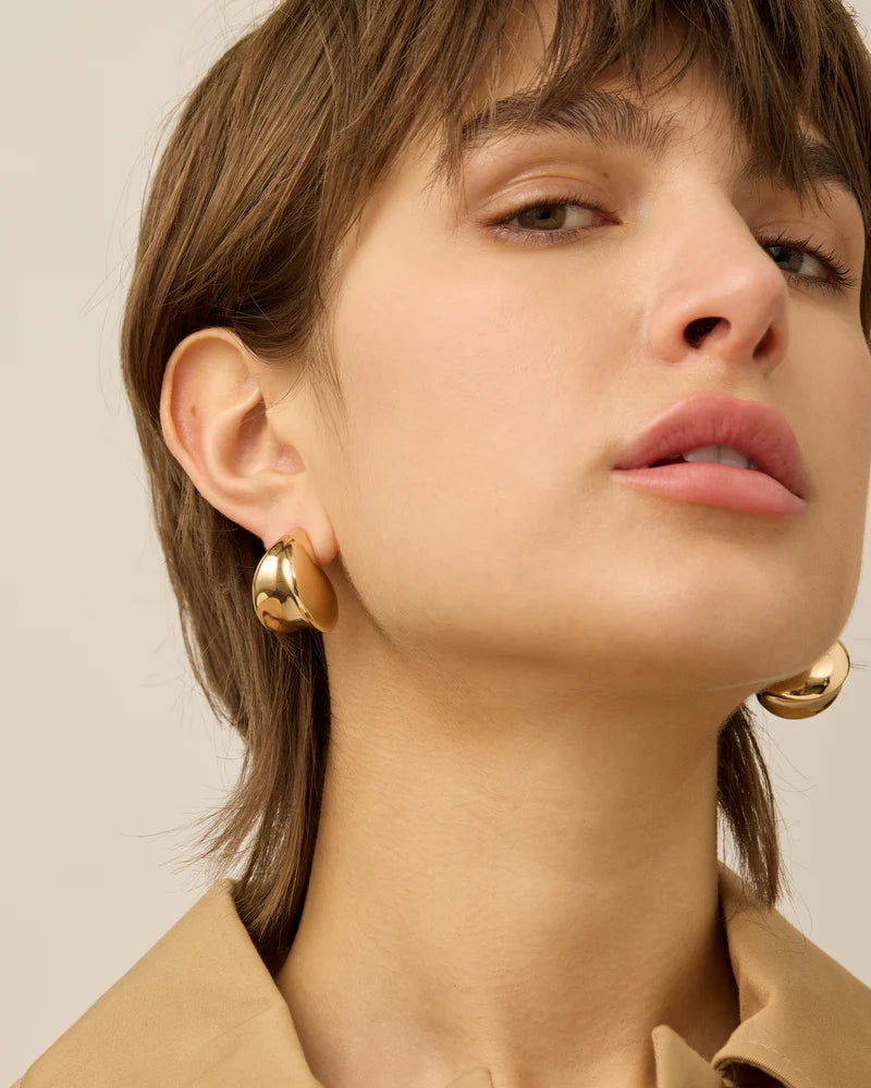 Paige Puff Earrings front view on model