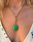 Odyssey Link Necklace in Green front view on model showing green side