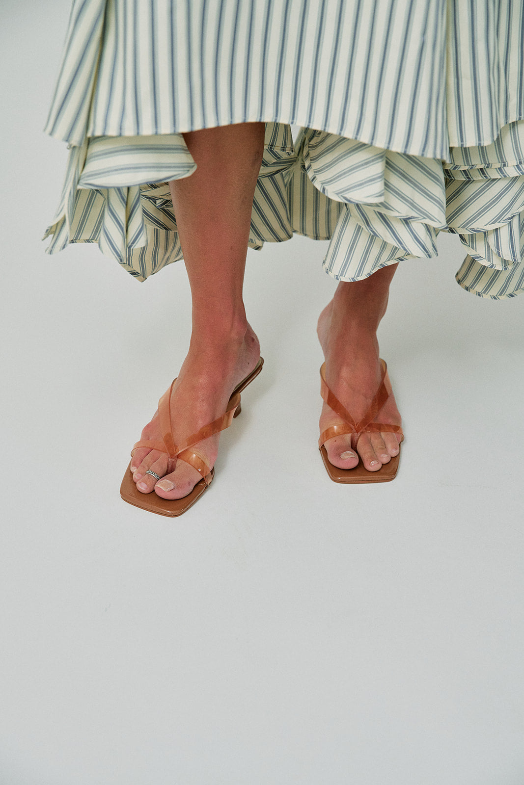 Brevel Vinyl Heels on feet, close up 