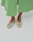 Cason Woven Leather Flat with green dress