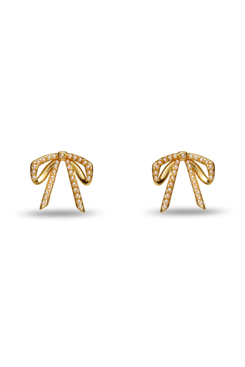 Lele Sadoughi Mini Bow Stud Earrings flat lay