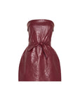 faux leather strapless dress laying flat on a white background