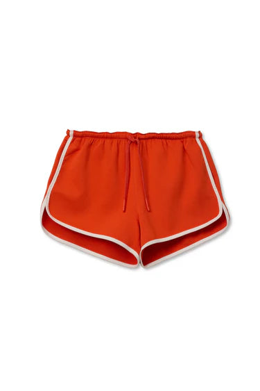 Orange shorts with white trim on a white background
