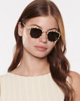 Pascal 12k Titanium + Oki Yuzu Sunglasses on model with average, oval face shape