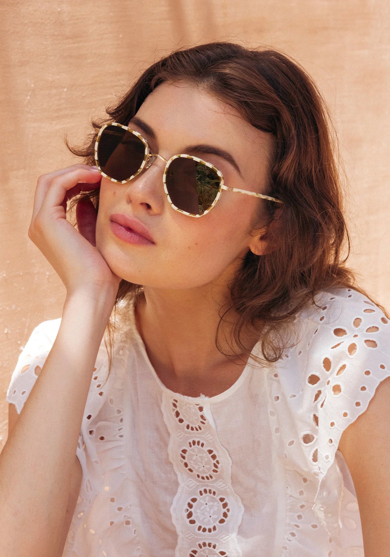 Pascal 12k Titanium + Oki Yuzu Sunglasses on model with average oval face shape