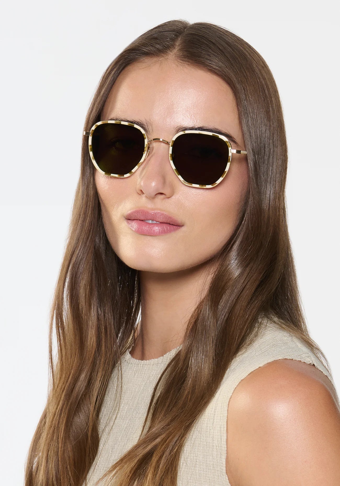 Pascal 12k Titanium + Oki Yuzu Sunglasses on model with wide, heart face shape