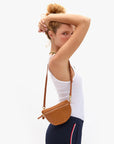 Petite Fanny Tan Rattan on shoulder
