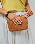 wooden bracelet, brown bag and Bitsy Ring