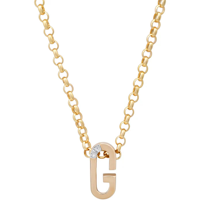Gold necklace with a letter 'G' pendant on a white background