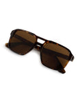 A pair of square-frame sunglasses with dark brown lenses and a tortoiseshell patterned frame, shown on a plain white background.