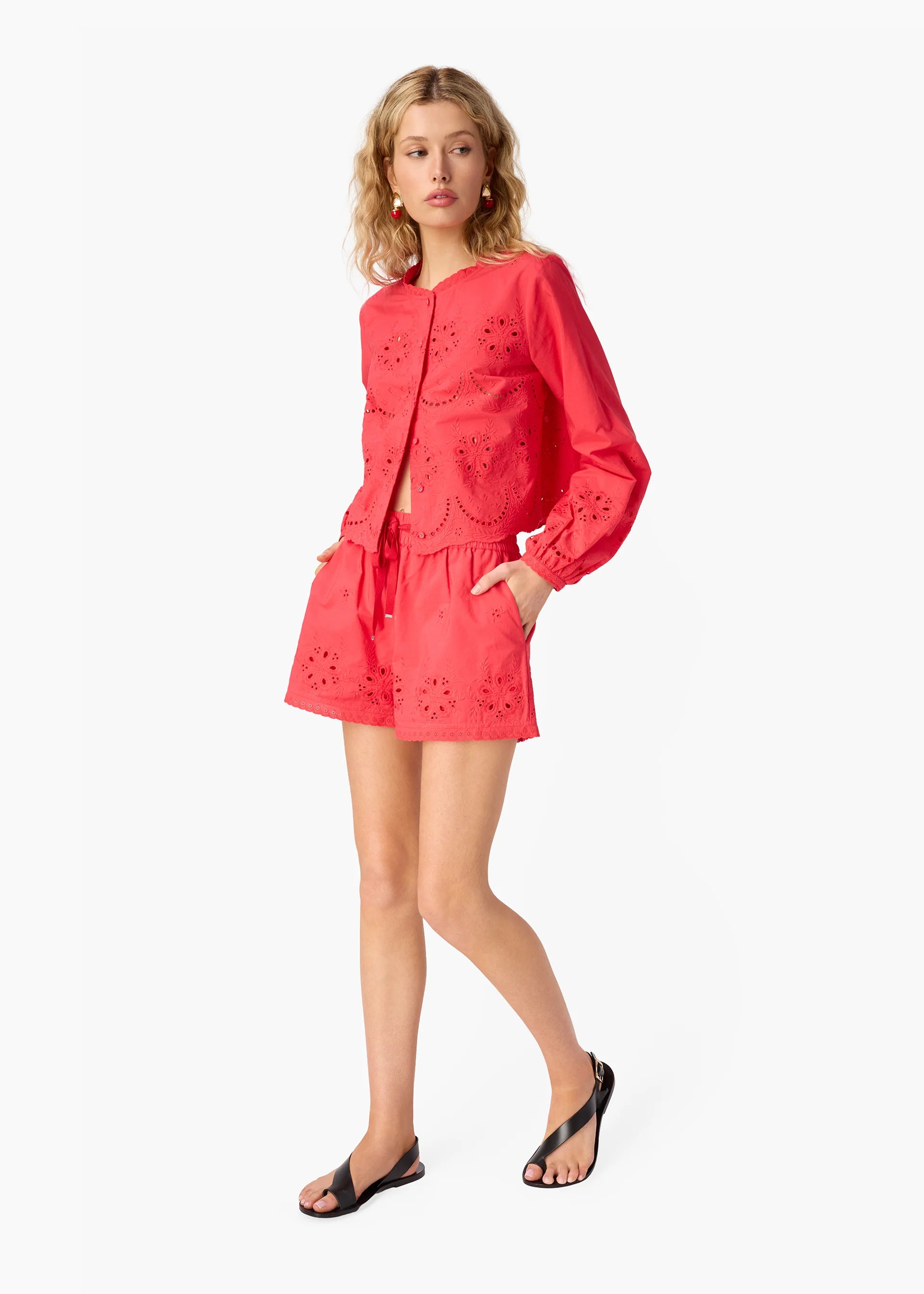 Jomi Mid Rise Cotton Short side view, hands in pockets