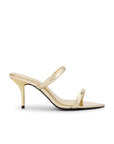 gold high-heeled sandal on a white background