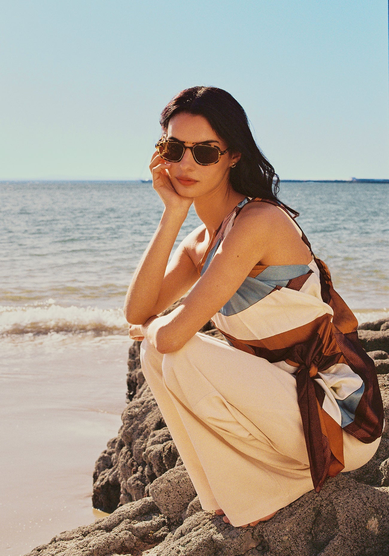Jordan Sunglasses Nikko Tortoise + 12K Polarized full body view on model with average, square face shape