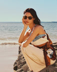 Jordan Sunglasses Nikko Tortoise + 12K Polarized full body view on model with average, square face shape