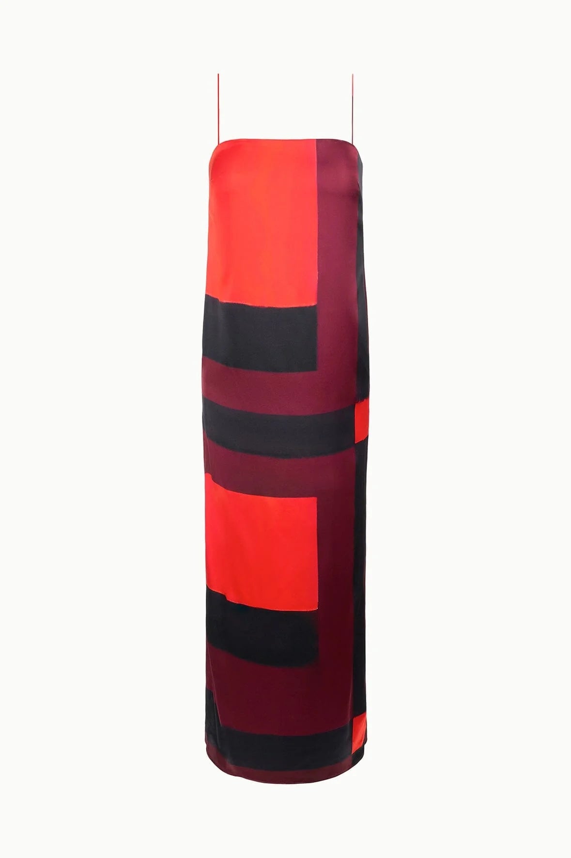 Tall cylindrical container with red and black geometric pattern on a white background