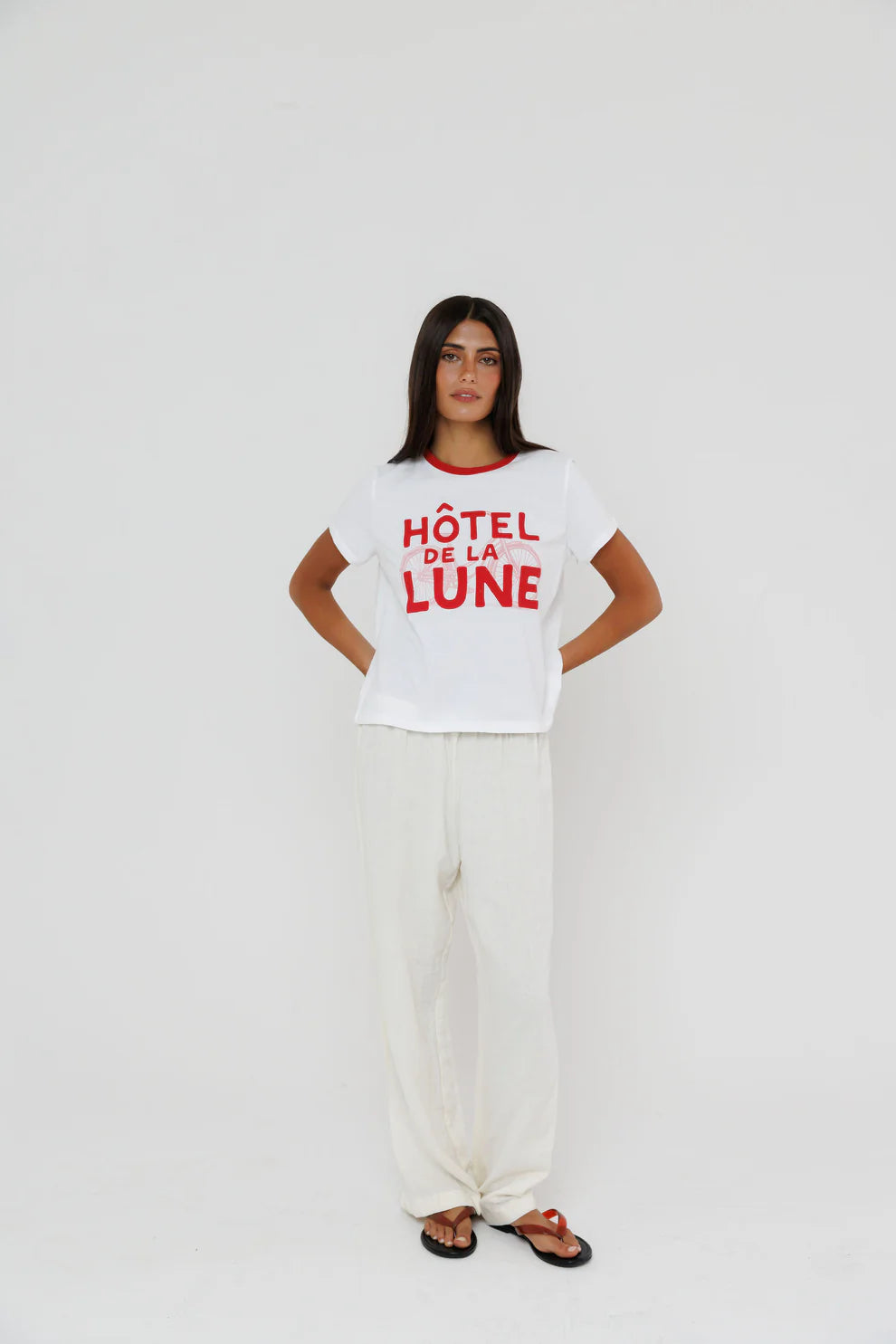 Hotel De La Lune Ringer Tee full body front view on model posing with hands behind her back