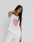 Sardine Summer Femme Crew close up front view on model posing with hand behind her neck