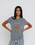 Capri Beach Club Femme Crew on a model with stripe pants on a white background