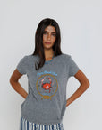Capri Beach Club Femme Crew on a model with stripe pants on a white background