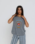 Capri Beach Club Femme Crew on a model with stripe pants on a white background