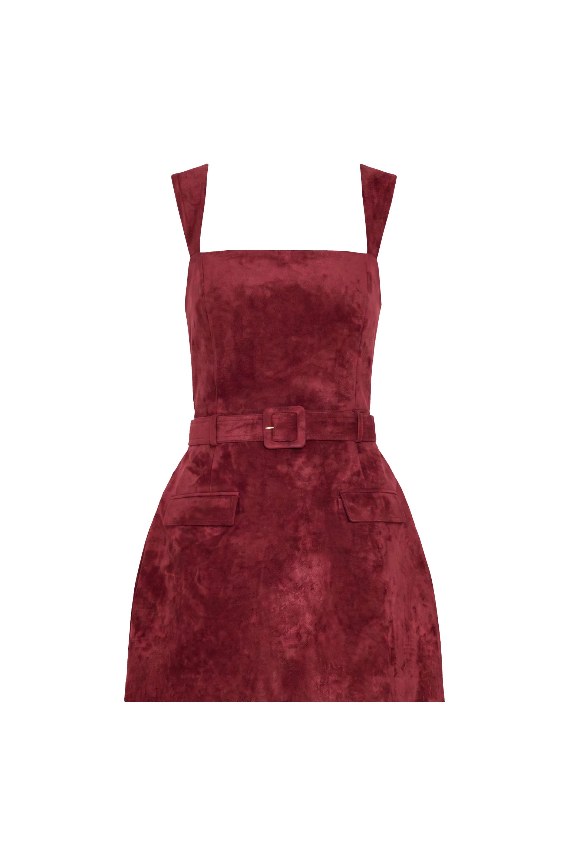 A sleeveless wine red velvet mini dress with shoulder straps, a matching belt with a square buckle, and front patch pockets, shown against a plain white background.