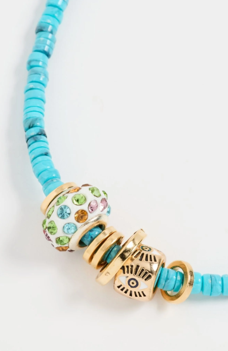 Turquoise beaded necklace with charms