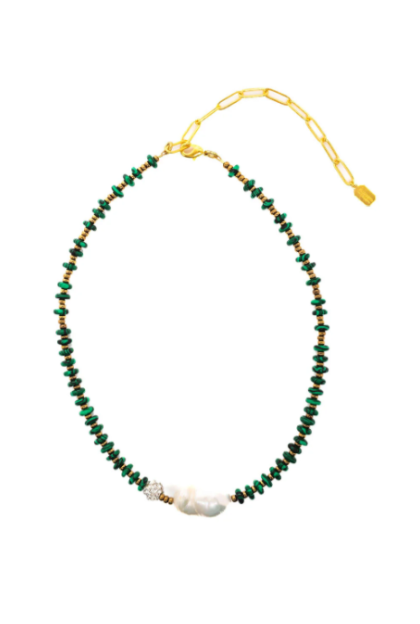 Necklace with green beads and a pearl on a white background