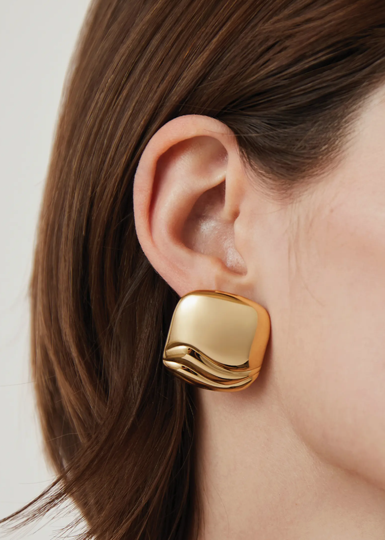 Rue Earrings Gold close up on ear