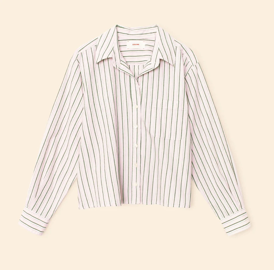 stripe long sleeve light pink top on a cream background