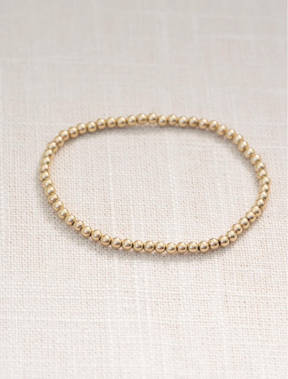 Coast + Cove 3mm Gold Ball Bracelet Flat Lay