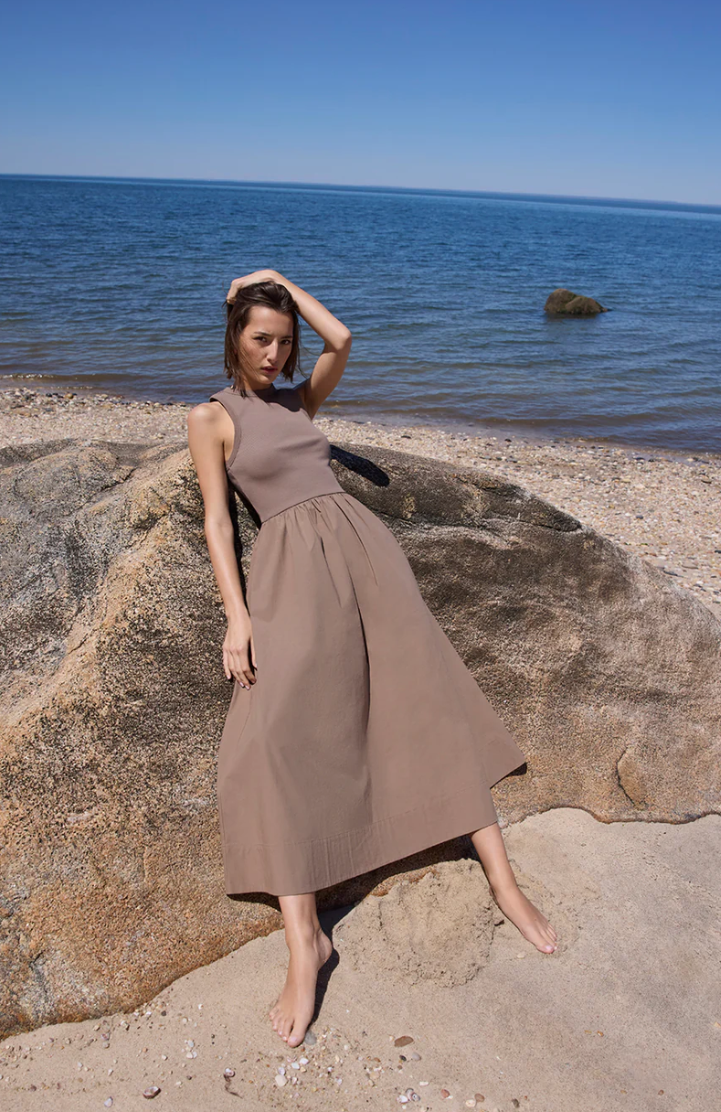 The RSVP Dress, model leaning against rock