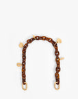 Shortie Strap Tortoise Resin with Sea Charms by itself on white background
