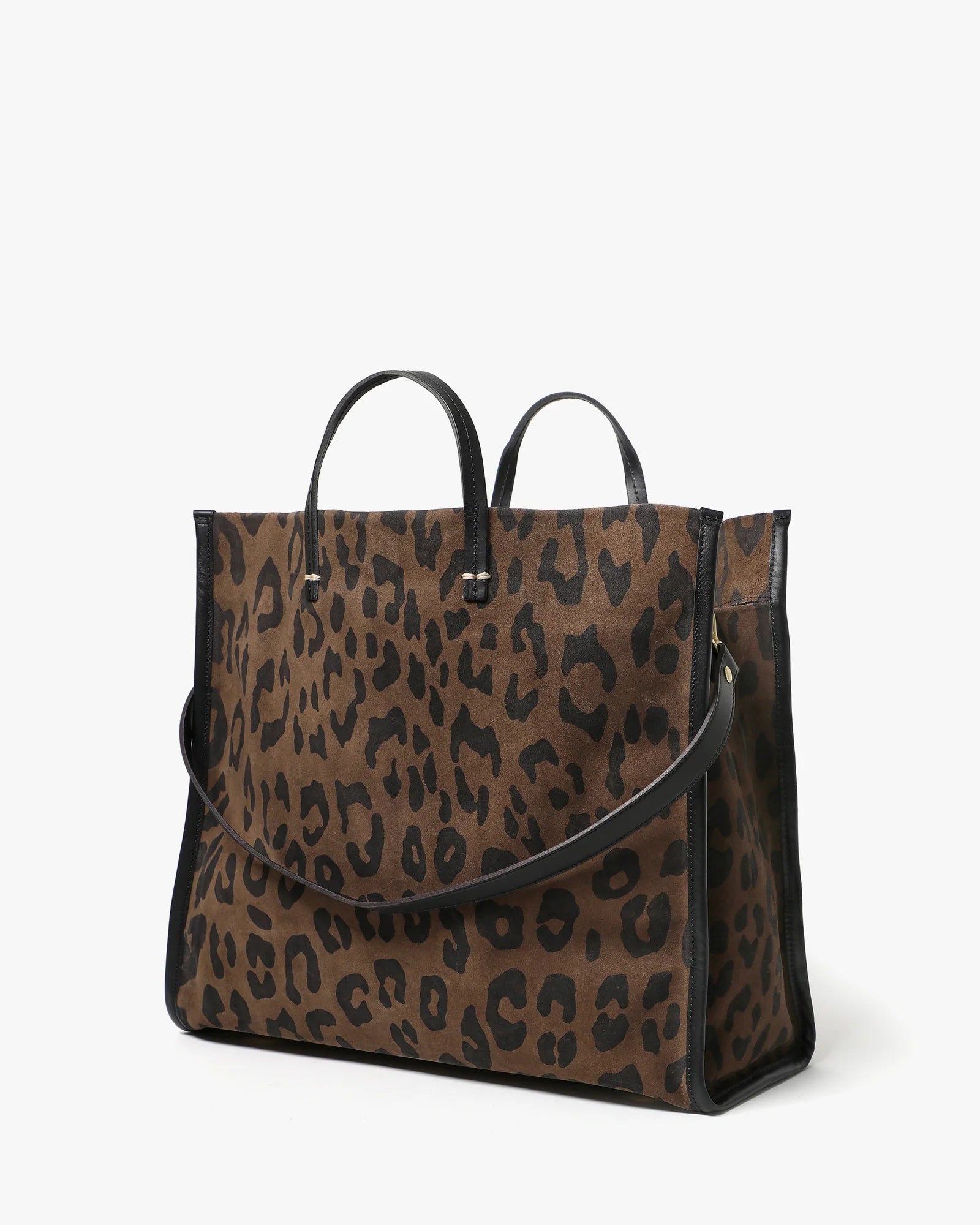 Leopard print handbag with black handles and trim on a white background