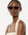 Solange Sunglasses Scarlet Chroma + Bordeaux on model with narrow, oval face shape