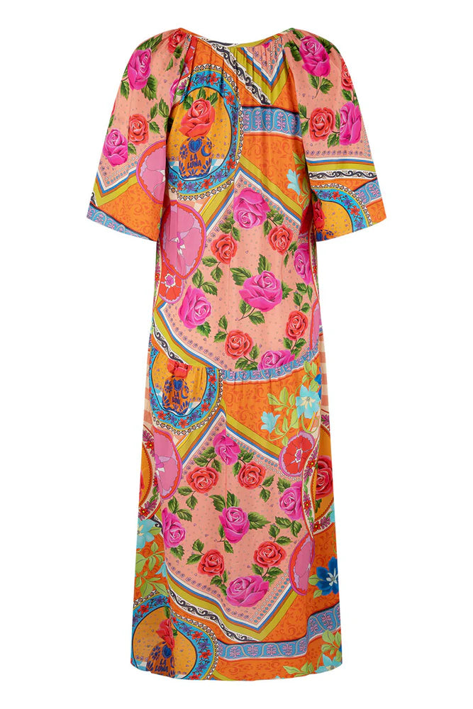 Colorful dress with floral pattern on a white background, back