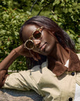 ST. LOUIS Matte Oyster 24K Sunglasses on model with narrow oval face shape