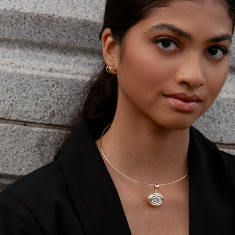 Quinn Hoop Earrings front and partial side view on model