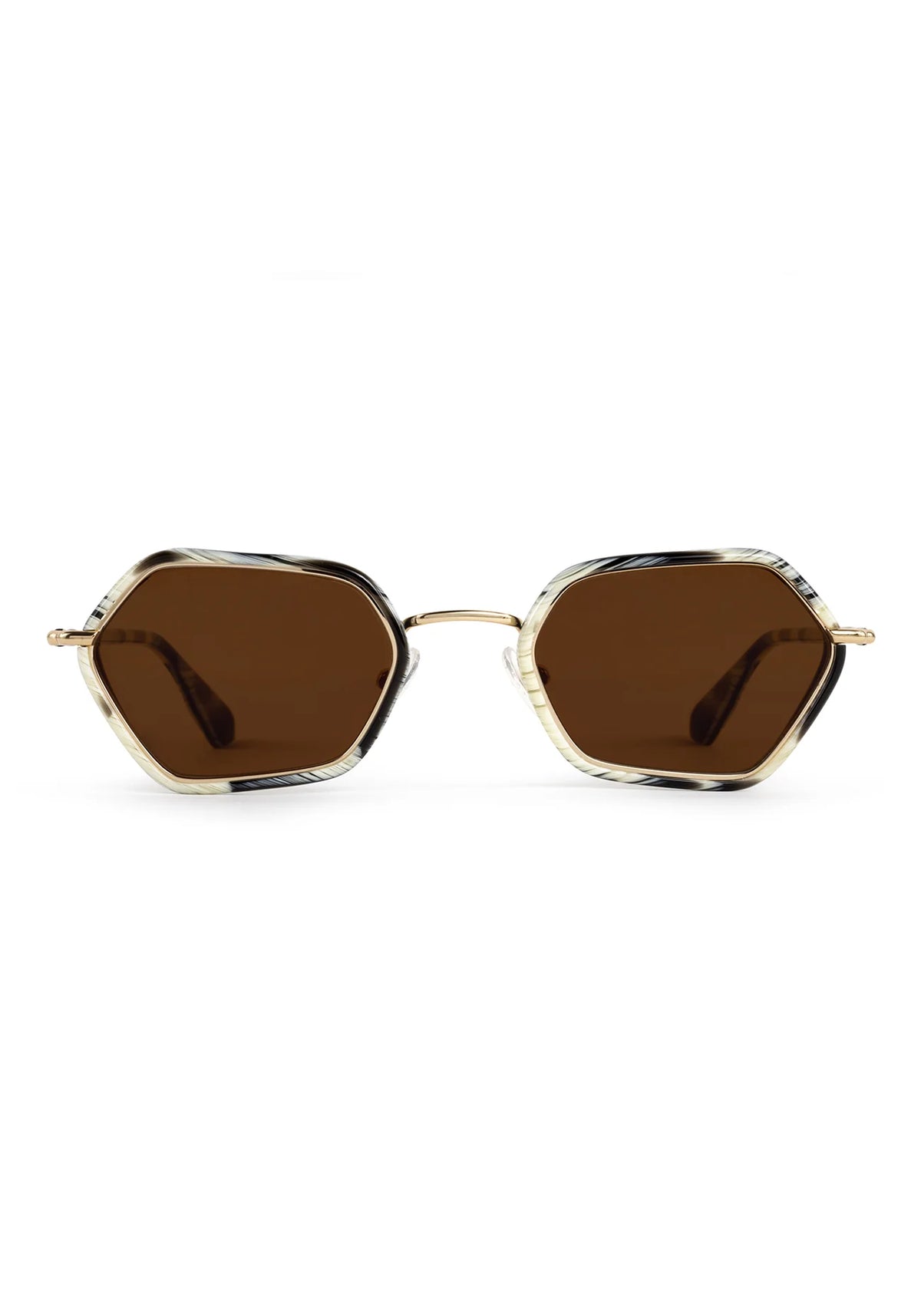 Hexagonal sunglasses with dark brown lenses, a gold metal bridge, and a tortoiseshell frame with black, brown, and beige tones, shown against a plain white background.