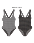 The Reversible Cross-Back One Piece both sides laid flat
